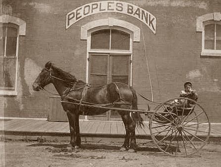 PEOPLES BANK, CHILD WITH TROTTER IN FRONT, 000 BLOCK O WEST 3RD- A